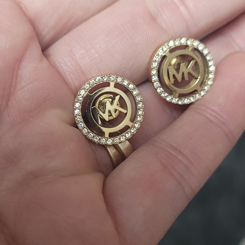 Michael kors studs. One Stone Missing In One Of The Studs